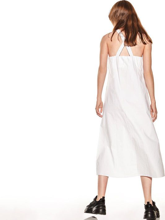 Verdissima's Isla collection from Italy offers an elegant maxi sundress crafted from lightweight, breathable cotton fabric, promising a cool and comfortable feeling all day long.