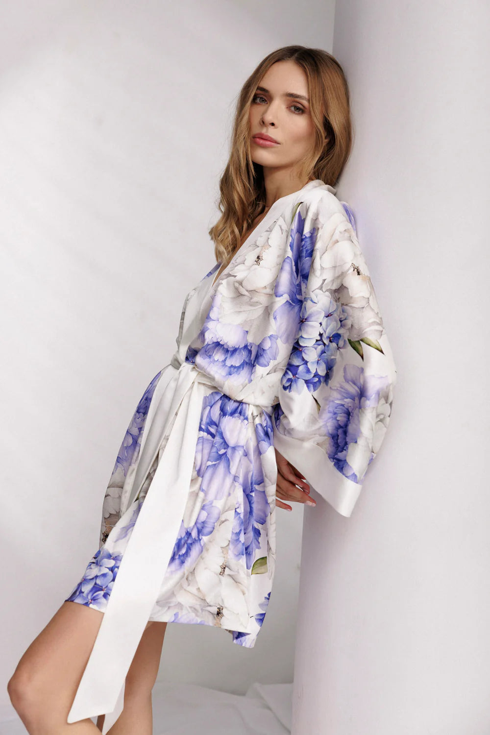 Woman wearing a floral silk kimono 